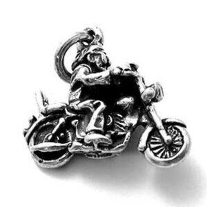 BIKER ON A MOTORCYCLE CHARM. STERLING SILVER